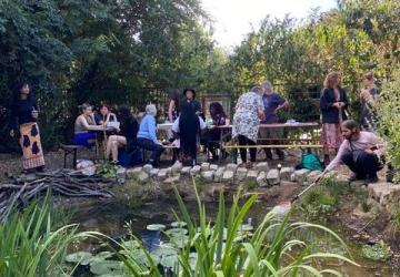 A group of people pond dipping