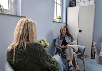 A counselling session with two women