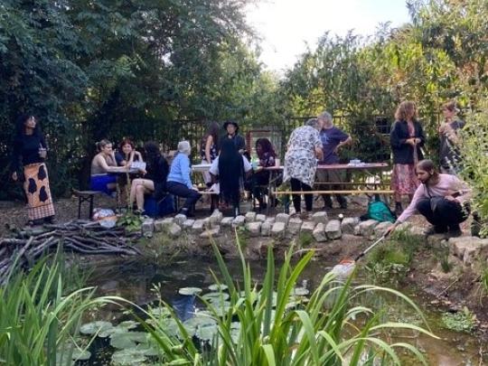 A group of people pond dipping